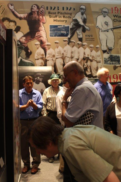Chris Eckes (in blue at left) leadin Cincinnati Reds Hall of Fame tour