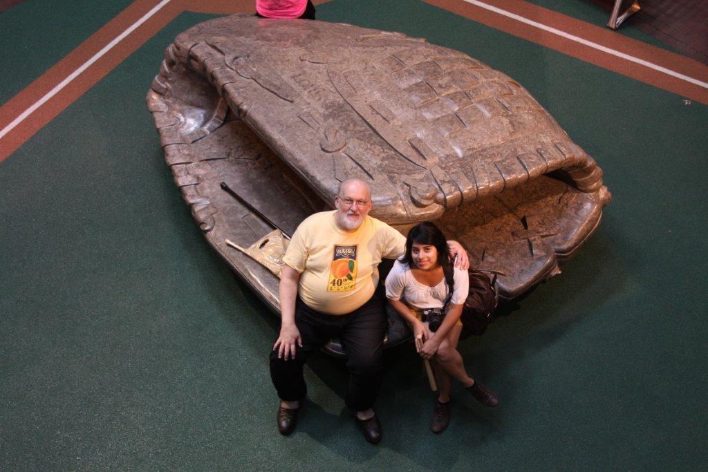 Waff with stepdaughter Roxana Bell sitting in a giant catcher’s mitt at the Louisville Slugger factory museum in August 2010.