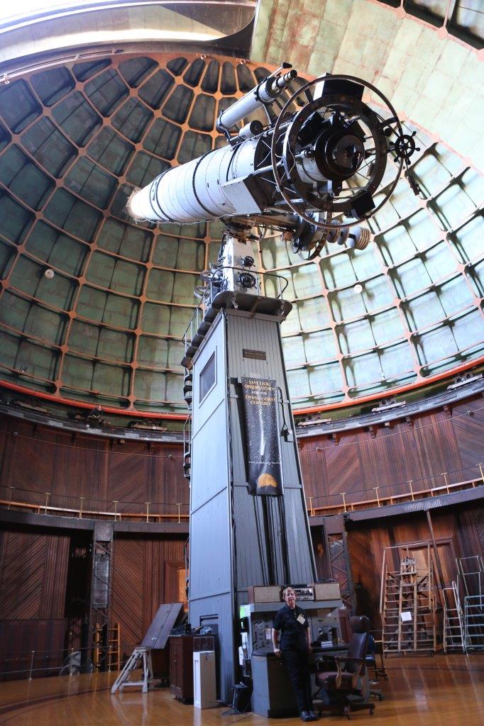 standing at base of Lick Observatory 36-inch refractor