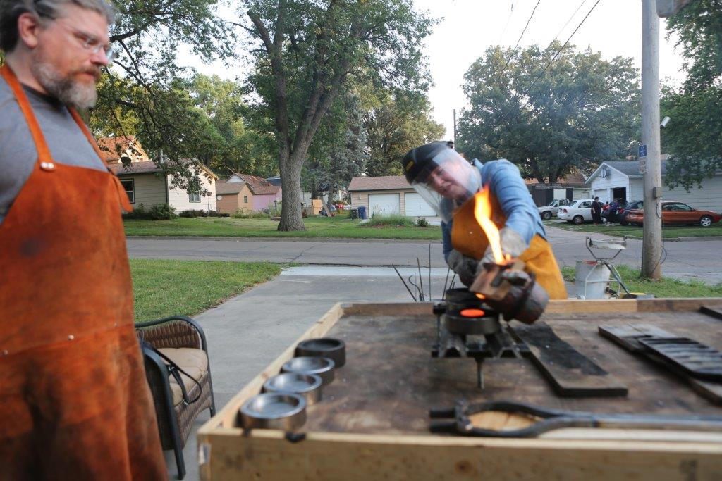 me pouring red-hot molten speculum metal into a 2-inch  mirror mold, Aug 2017