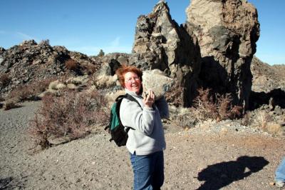 hefting a pumice boulder at Panum Crater, Mono Lake, Calif.